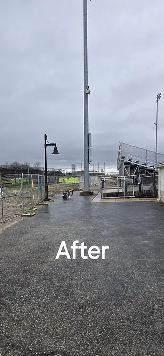 After: the same commercial lot area paved and cleaned by AB Pressure Solutions