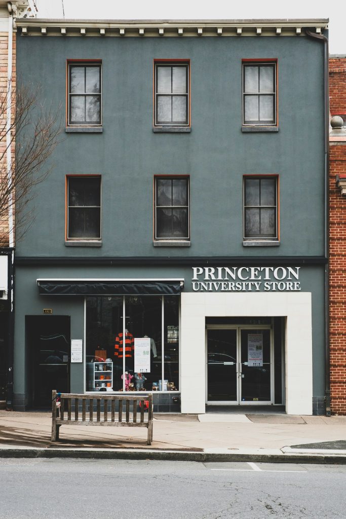 A clean brown and white commercial storefront building